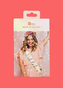 <p><span>Perfect for a summer wedding, give your hen party or bridal shower a pretty floral theme and kit the woman of the hour out in this gorgeous cream paper sash with floral details. The sash says &lsquo;Bride to be&rsquo; in stylish, gold-foiled script and is secured with a beautiful pink ribbon. One size fits all.</span><span> </span></p>